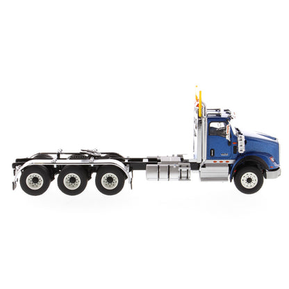 1:50 Scale Diecast Model of a Metallic Blue International HX620 Tri-Axle Day Cab Tractor on a White Background