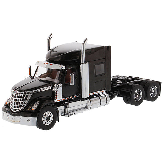 Model of a Black International LoneStar Mid-Roof Sleeper Tractor on a White Background
