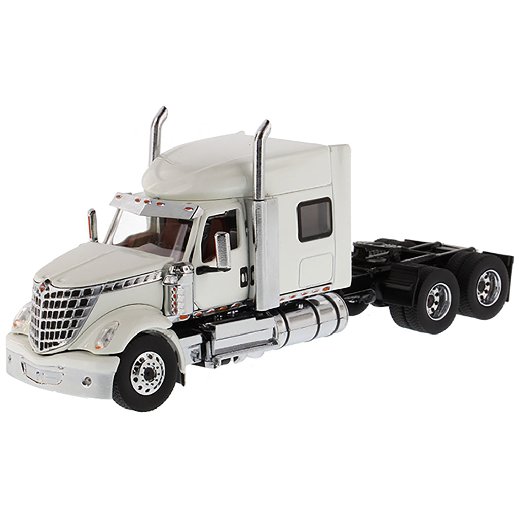 Model of a White International LoneStar Mid-Roof Sleeper Tractor on a White Background
