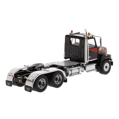 Model of a Western Star 4700 Tractor on a White Background
