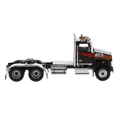 Model of a Western Star 4700 Tractor on a White Background