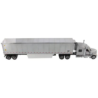 Model of a Silver International LoneStar Tandem Axle Mid-Roof Sleeper Tractor pulling a chrome plated 53' Refrigerated Freight Van Trailer on a white background