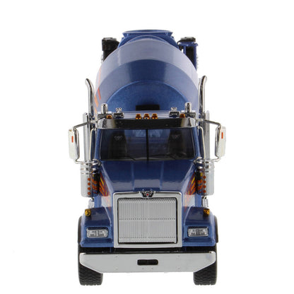 A die-cast model of a blue Western Star cement mixer truck with orange and yellow graphic accents, shown on a clean white background.