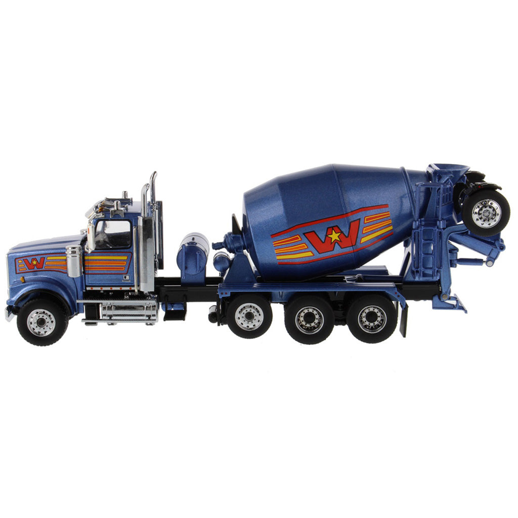 A die-cast model of a blue Western Star cement mixer truck with orange and yellow graphic accents, shown on a clean white background.