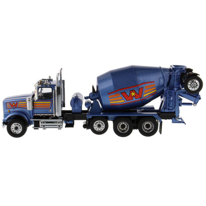 A die-cast model of a blue Western Star cement mixer truck with orange and yellow graphic accents, shown on a clean white background.