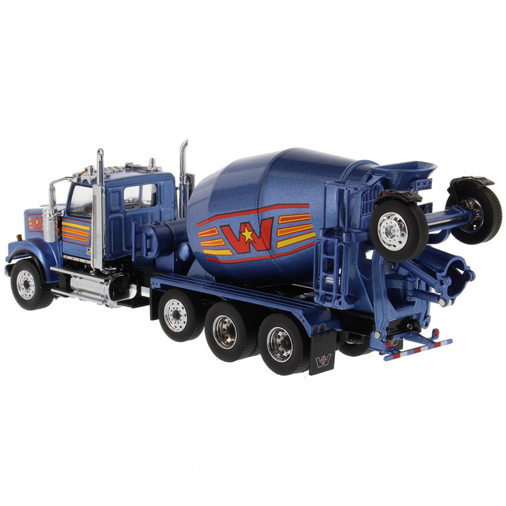 A die-cast model of a blue Western Star cement mixer truck with orange and yellow graphic accents, shown on a clean white background.