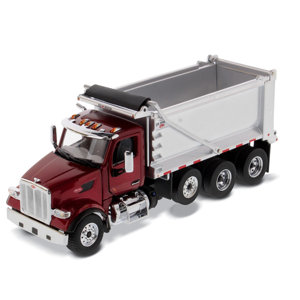 1:50th Scale Diecast Model of a Red & Silver Peterbilt Model 567 Dump Truck on a White Background