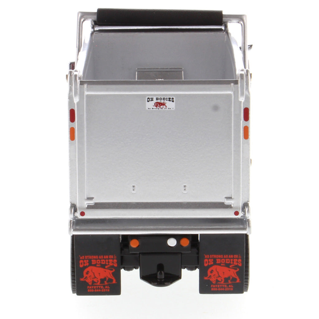 1:50th Scale Diecast Model of a Red & Silver Peterbilt Model 567 Dump Truck on a White Background