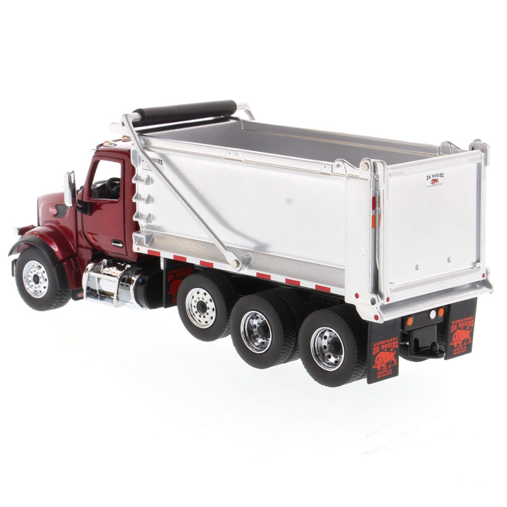 1:50th Scale Diecast Model of a Red & Silver Peterbilt Model 567 Dump Truck on a White Background