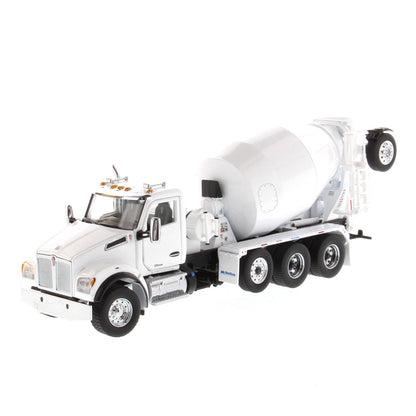 A white die-cast model of a Kenworth truck with a cement mixer drum, photographed on a seamless white background.
