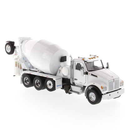 A white die-cast model of a Kenworth truck with a cement mixer drum, photographed on a seamless white background.