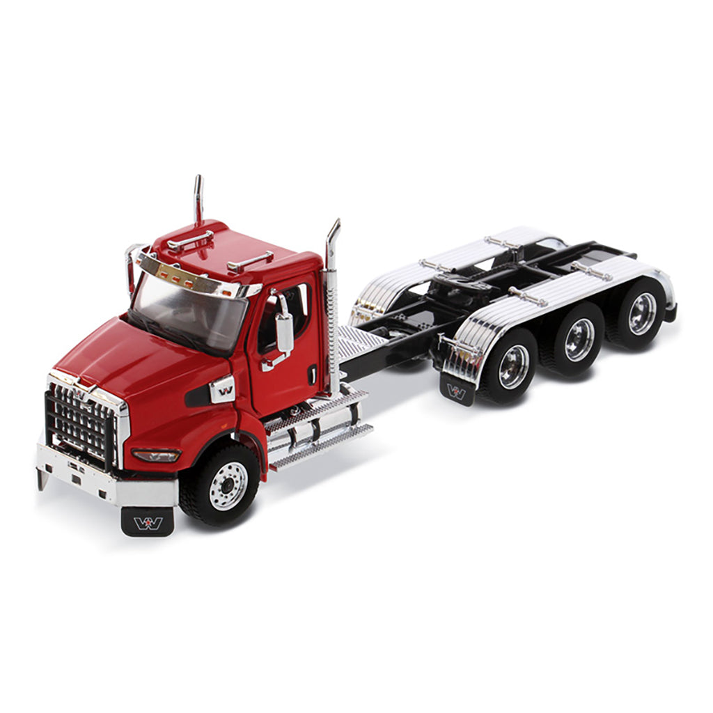 Model of a red Western Star 49X with Set-Back Front Axle and Tri-Drive on a White Background