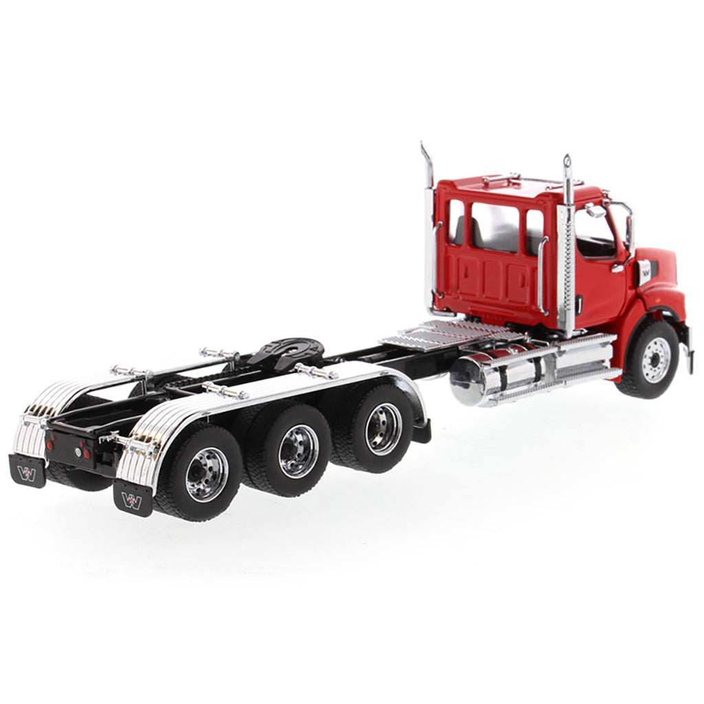 Model of a red Western Star 49X with Set-Back Front Axle and Tri-Drive on a White Background
