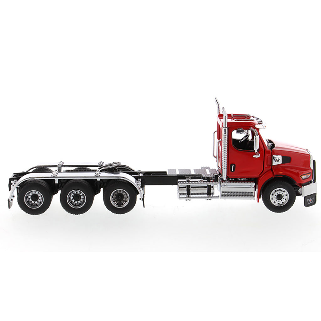 Model of a red Western Star 49X with Set-Back Front Axle and Tri-Drive on a White Background
