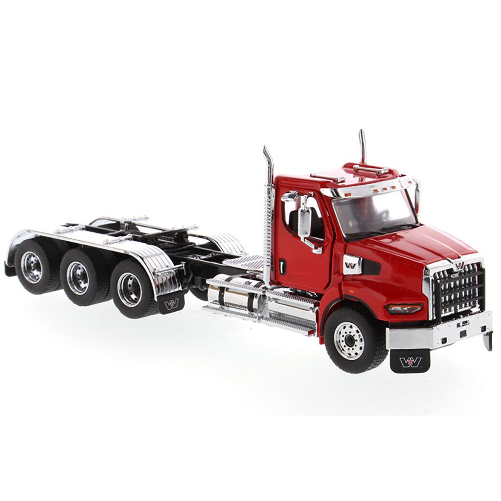 Model of a red Western Star 49X with Set-Back Front Axle and Tri-Drive on a White Background