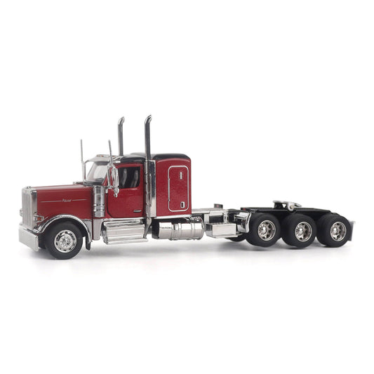 Model of a Peterbilt Model 589 Legendary Package Tri-Axle Sleeper Semi-Tractor on a White Background