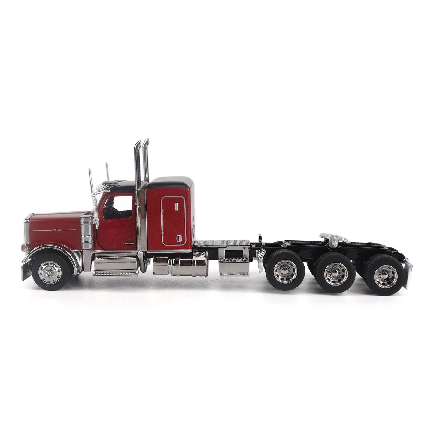 Model of a Peterbilt Model 589 Legendary Package Tri-Axle Sleeper Semi-Tractor on a White Background