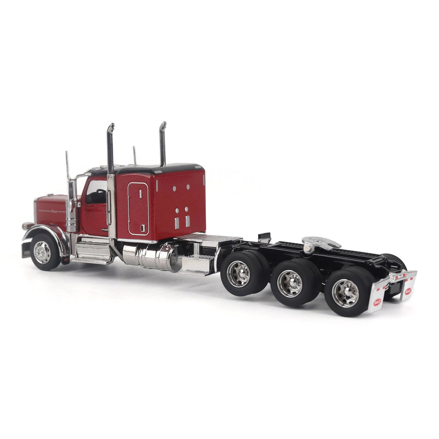 Model of a Peterbilt Model 589 Legendary Package Tri-Axle Sleeper Semi-Tractor on a White Background