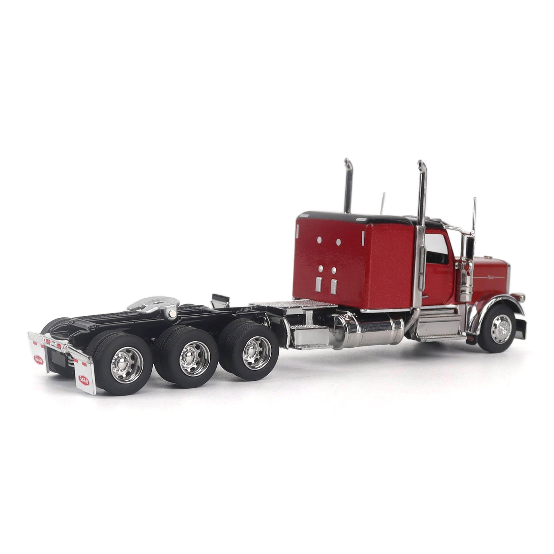 Model of a Peterbilt Model 589 Legendary Package Tri-Axle Sleeper Semi-Tractor on a White Background
