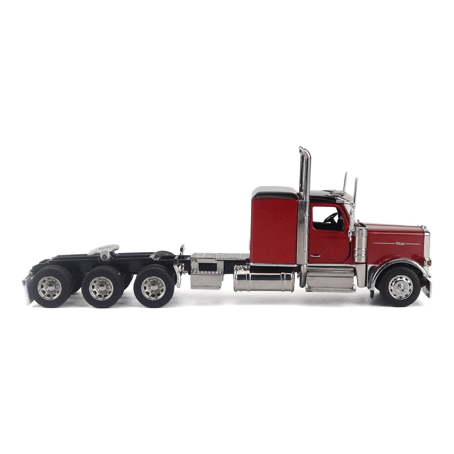 Model of a Peterbilt Model 589 Legendary Package Tri-Axle Sleeper Semi-Tractor on a White Background