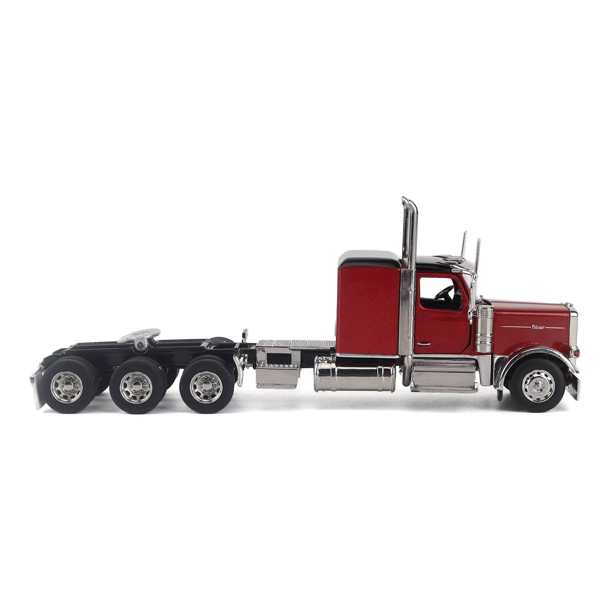 Model of a Peterbilt Model 589 Legendary Package Tri-Axle Sleeper Semi-Tractor on a White Background