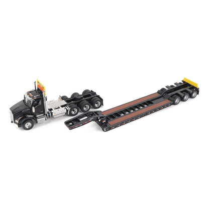 A detailed diecast model of a Kenworth T880 semi-truck towing a long black Trail King TK120 rgn lowboy trailer with a brown wood-look deck and yellow end caps, shown on a plain white background.