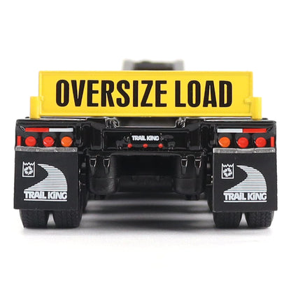 Rear view of a black and yellow Trail King oversize load trailer, featuring a large yellow sign with black text reading 'OVERSIZE LOAD' and Trail King branding on the bumper and side mudflaps.