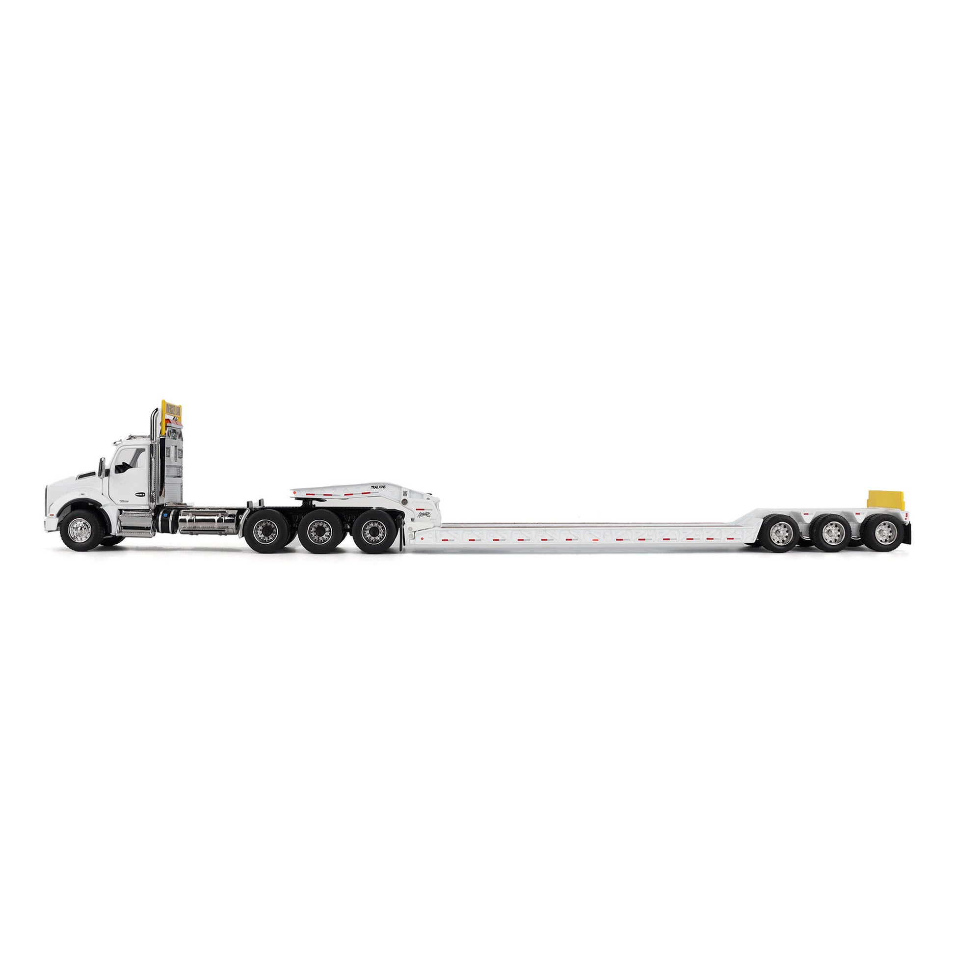 A detailed diecast model of a Kenworth T880 semi-truck towing a long black Trail King TK120 rgn lowboy trailer with a brown wood-look deck and yellow end caps, shown on a plain white background.
