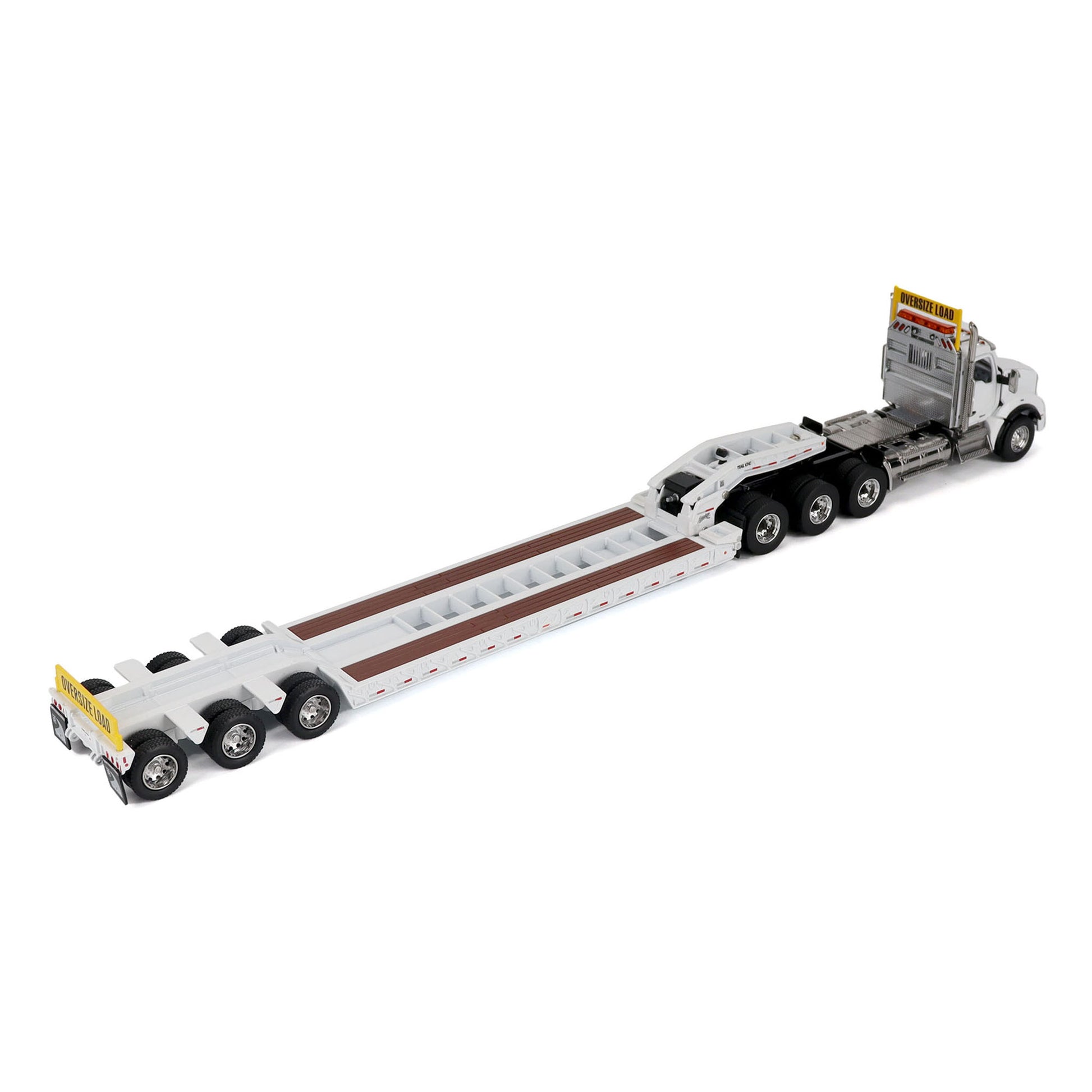A detailed diecast model of a Kenworth T880 semi-truck towing a long black Trail King TK120 rgn lowboy trailer with a brown wood-look deck and yellow end caps, shown on a plain white background.