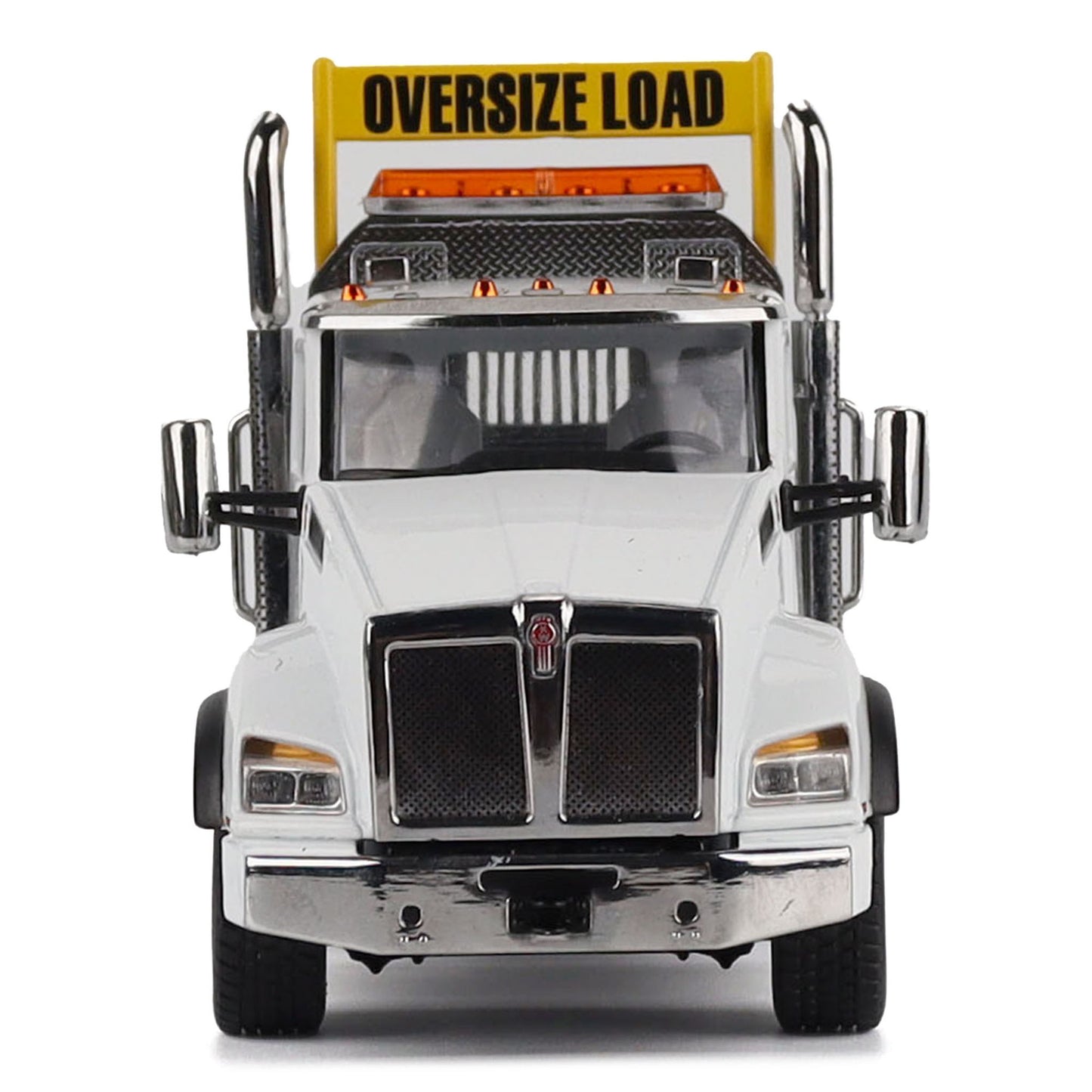 A detailed diecast model of a Kenworth T880 semi-truck towing a long black Trail King TK120 rgn lowboy trailer with a brown wood-look deck and yellow end caps, shown on a plain white background.