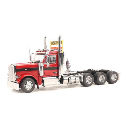 1:32nd Scale Diecast Model of a Peterbilt Model 589 Day Cab Tractor with Tri-Axle Configuration Photographed on a Clean White Background