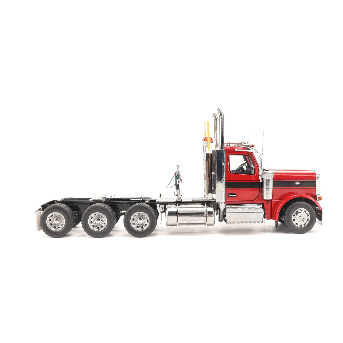 1:32nd Scale Diecast Model of a Peterbilt Model 589 Day Cab Tractor with Tri-Axle Configuration Photographed on a Clean White Background