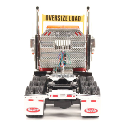 1:32nd Scale Diecast Model of a Peterbilt Model 589 Day Cab Tractor with Tri-Axle Configuration Photographed on a Clean White Background
