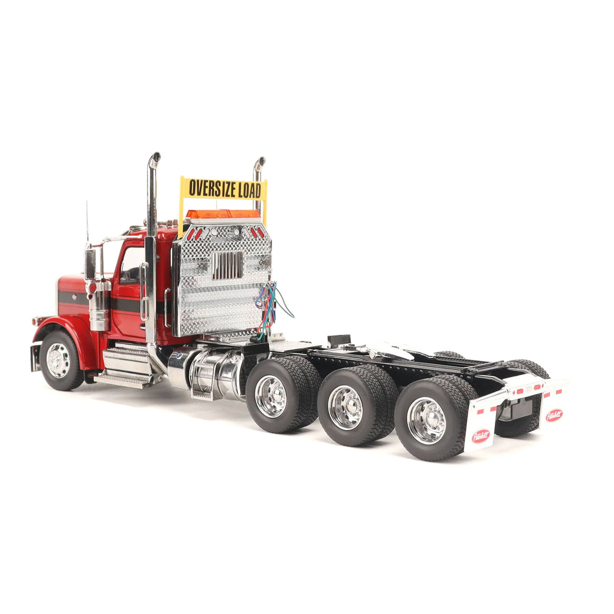 1:32nd Scale Diecast Model of a Peterbilt Model 589 Day Cab Tractor with Tri-Axle Configuration Photographed on a Clean White Background