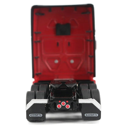 Back view of a model truck with open cargo area on a white background