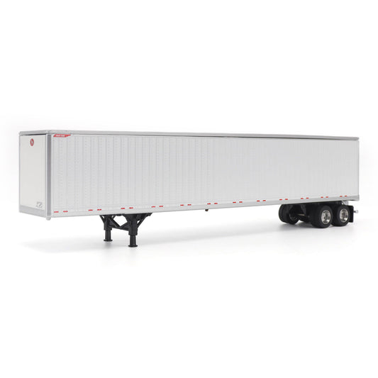 A long white Great Dane Champion semi-trailer shown in side view on a clean white studio background, with black wheels and support legs visible.