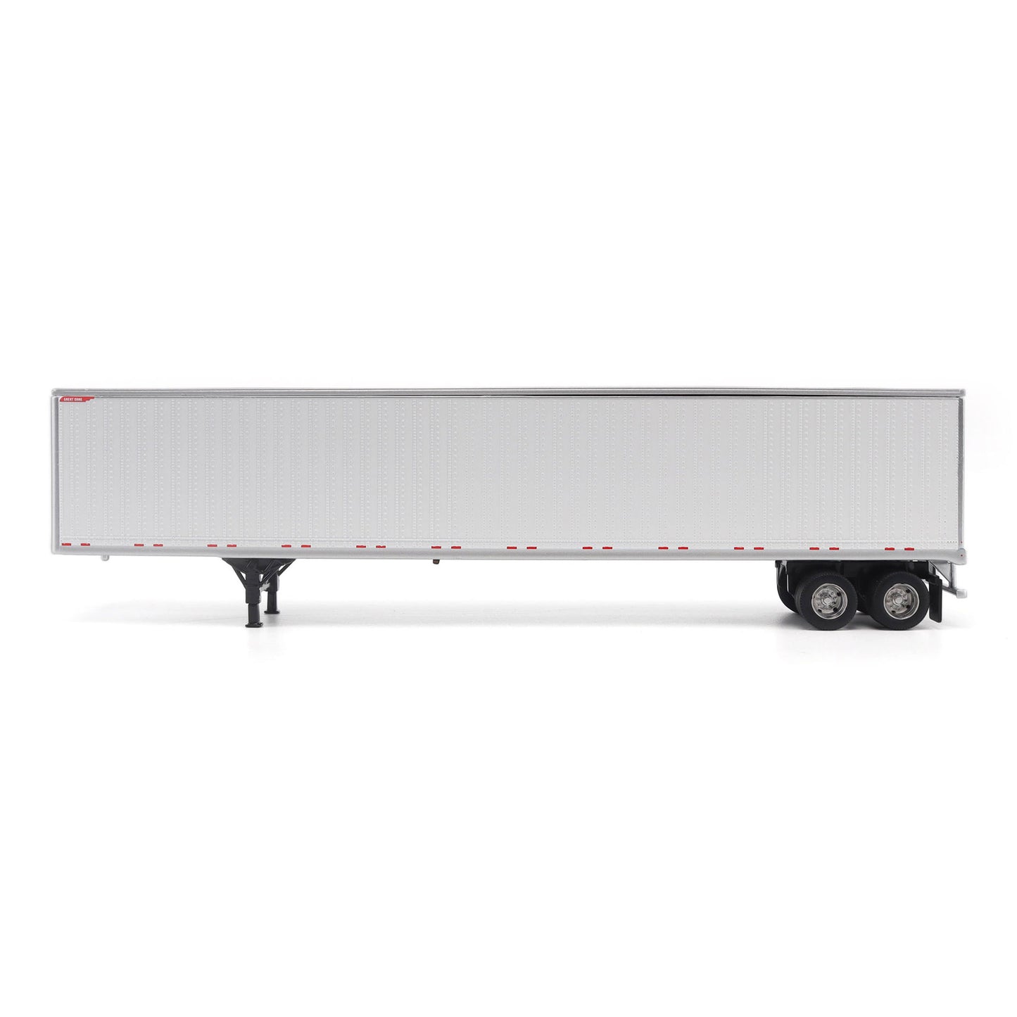A long white Great Dane Champion semi-trailer shown in side view on a clean white studio background, with black wheels and support legs visible.