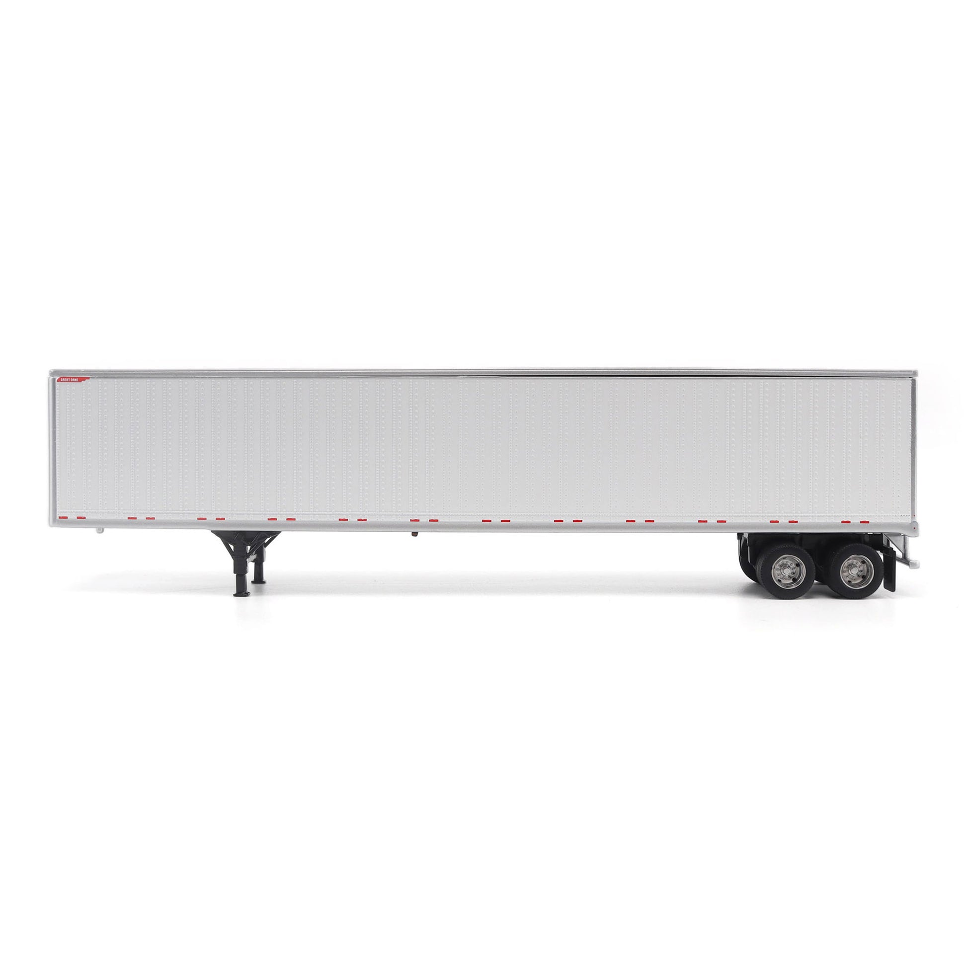 A long white Great Dane Champion semi-trailer shown in side view on a clean white studio background, with black wheels and support legs visible.