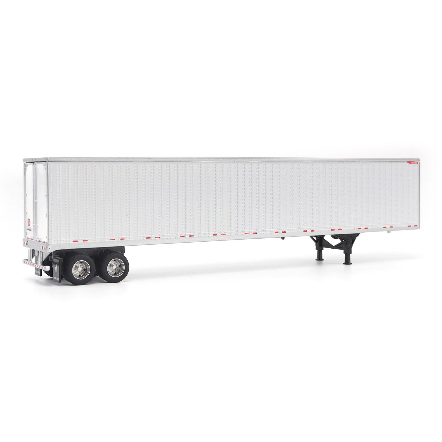 A long white Great Dane Champion semi-trailer shown in side view on a clean white studio background, with black wheels and support legs visible.