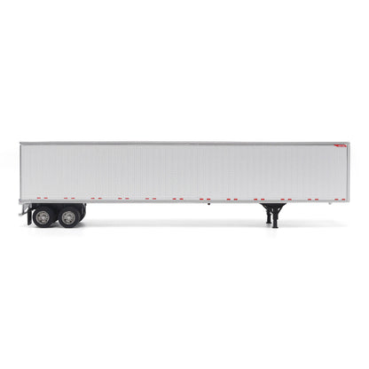 A long white Great Dane Champion semi-trailer shown in side view on a clean white studio background, with black wheels and support legs visible.
