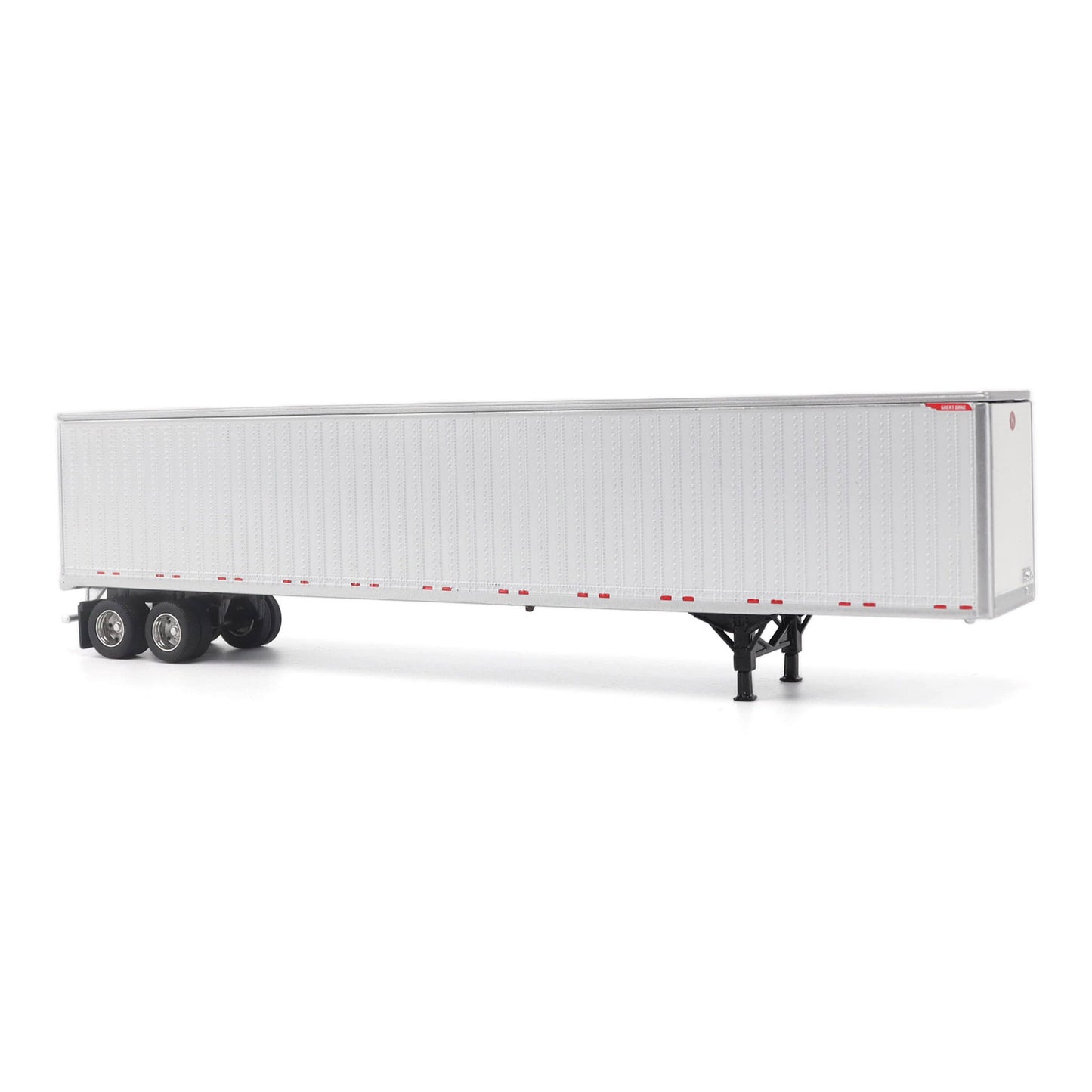 A long white Great Dane Champion semi-trailer shown in side view on a clean white studio background, with black wheels and support legs visible.