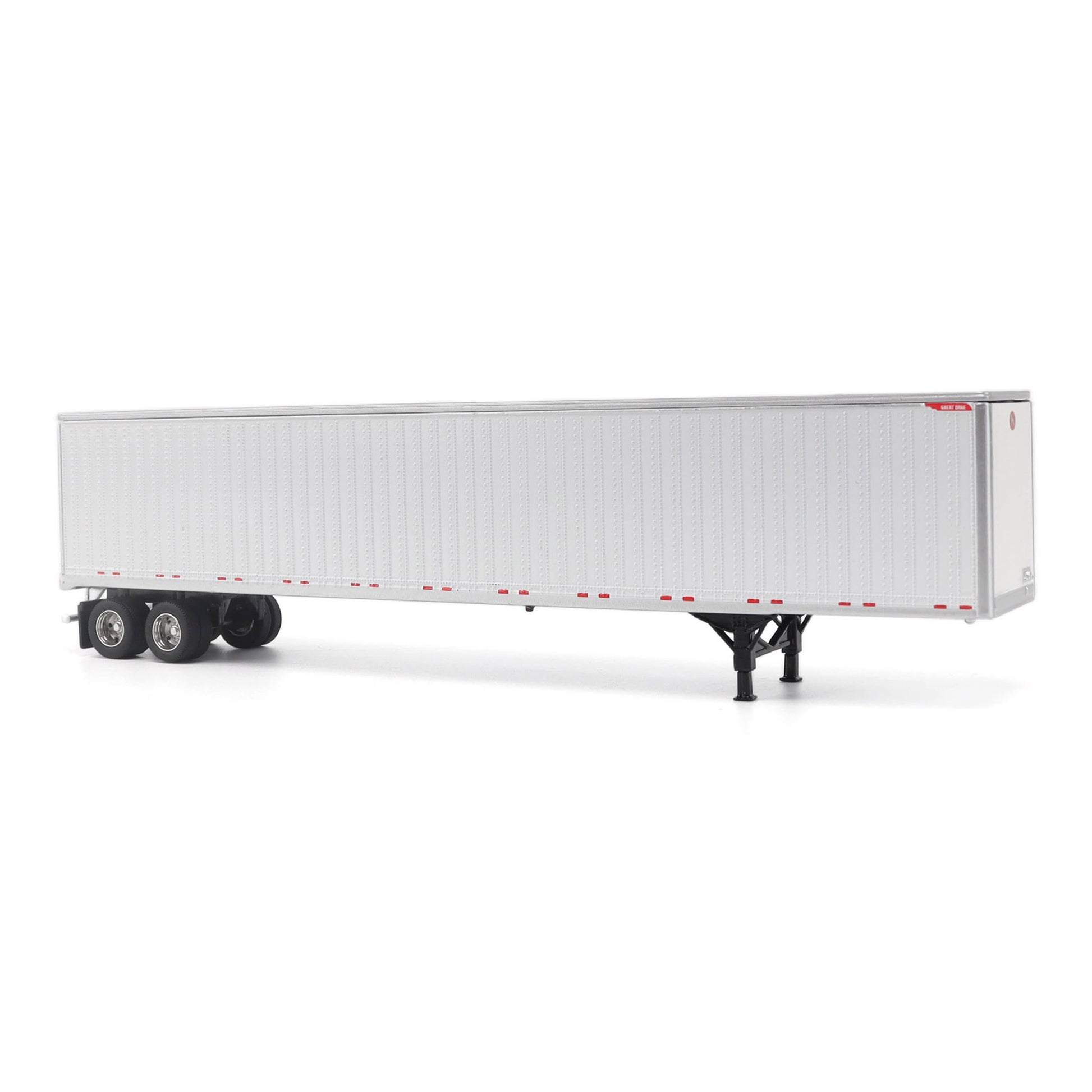 A long white Great Dane Champion semi-trailer shown in side view on a clean white studio background, with black wheels and support legs visible.