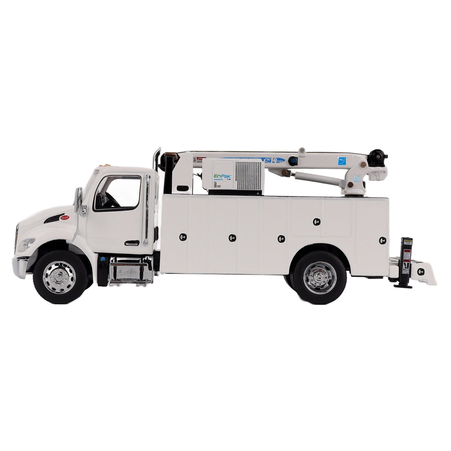 A White Diecast Model of a Peterbilt Model 536 Service Truck on a White Background