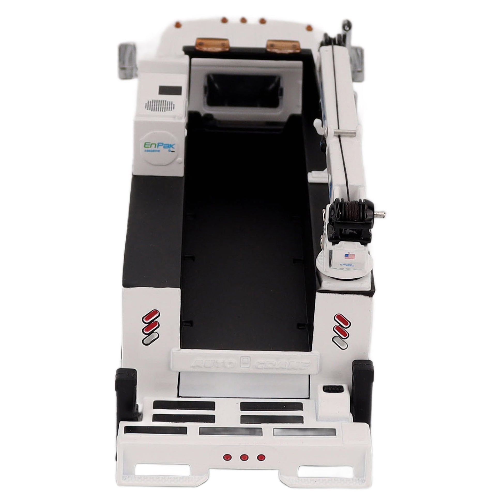 A White Diecast Model of a Peterbilt Model 536 Service Truck on a White Background