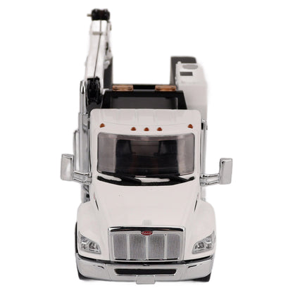 A White Diecast Model of a Peterbilt Model 536 Service Truck on a White Background