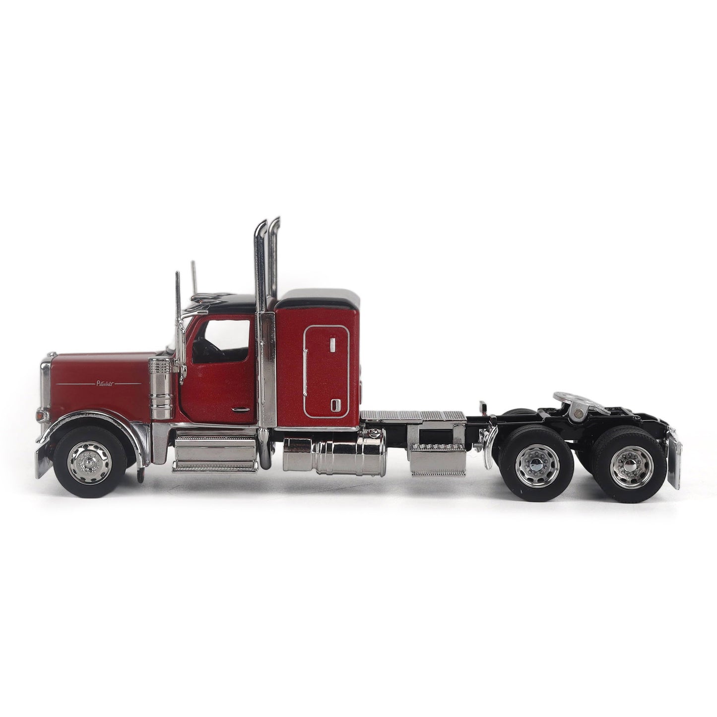 A Model of a Red & Black Peterbilt 589 Sleeper Tractor on a White Background