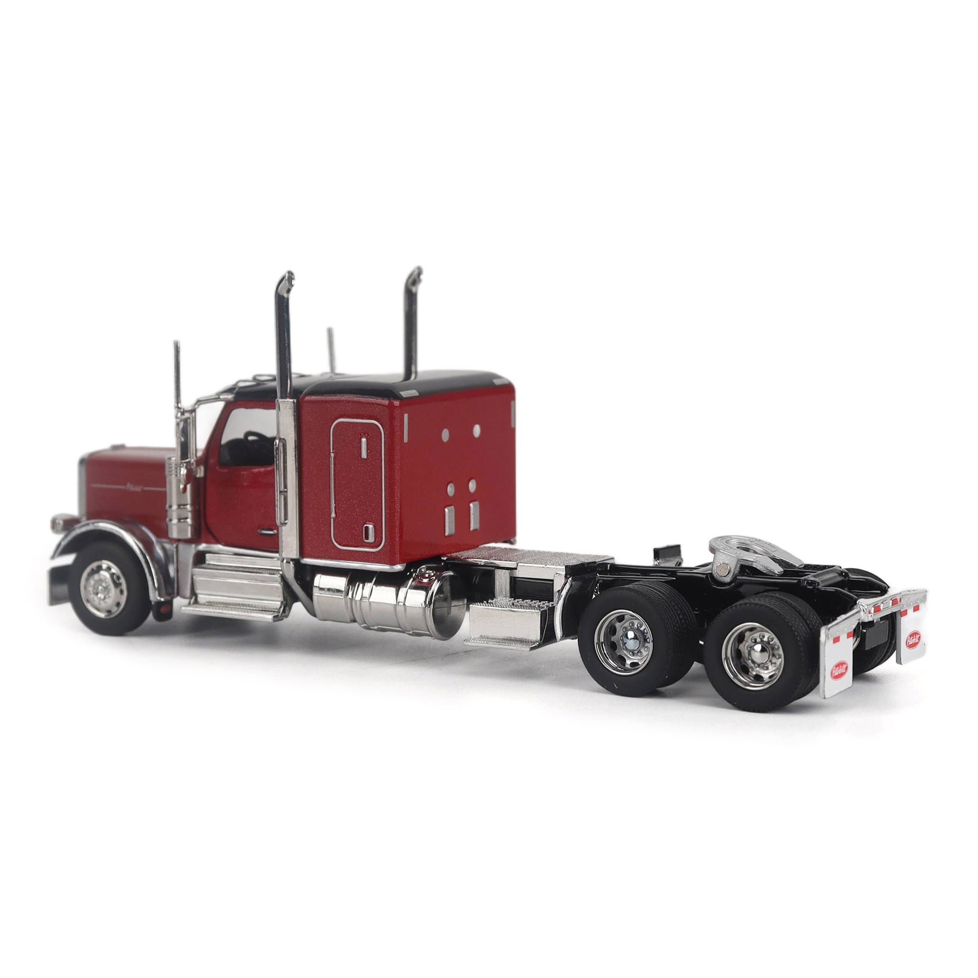 A Model of a Red & Black Peterbilt 589 Sleeper Tractor on a White Background