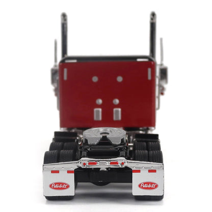 A Model of a Red & Black Peterbilt 589 Sleeper Tractor on a White Background