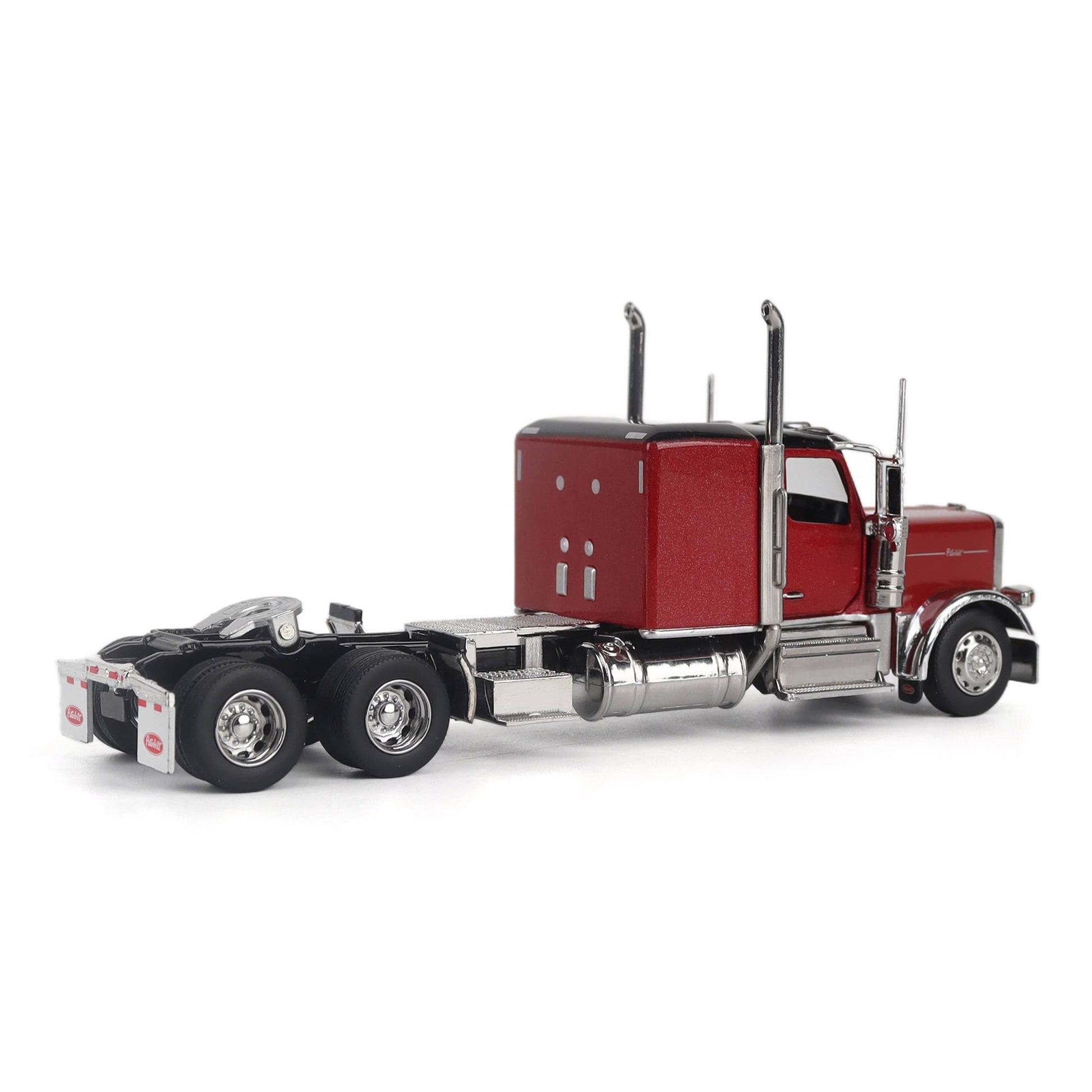 A Model of a Red & Black Peterbilt 589 Sleeper Tractor on a White Background