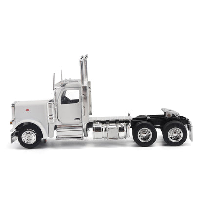 A detailed model of a classic white Peterbilt Model 589 day cab semi-truck cab with chrome exhausts, chrome wheels, and a black fuel tank and tires on a white background.